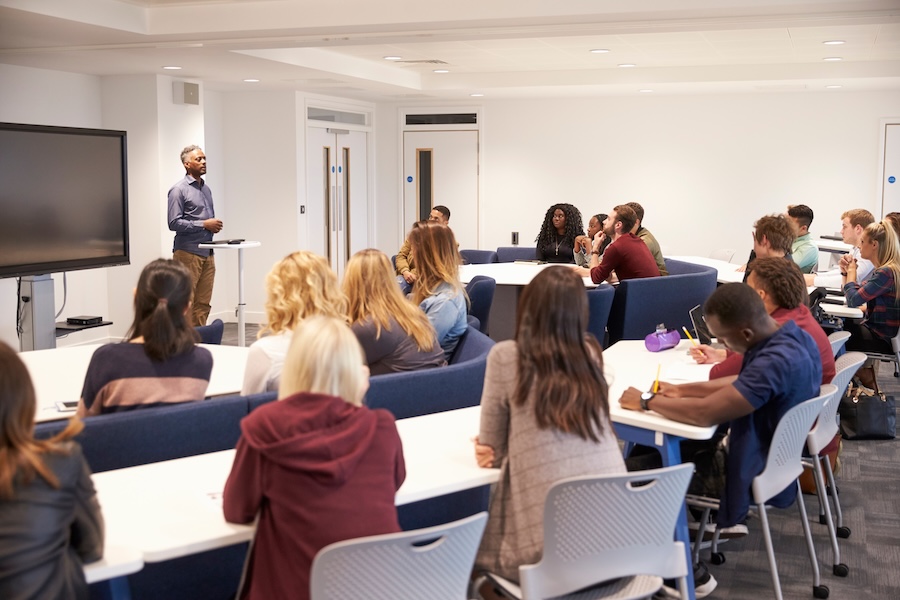 Professor teaching students in a classroom