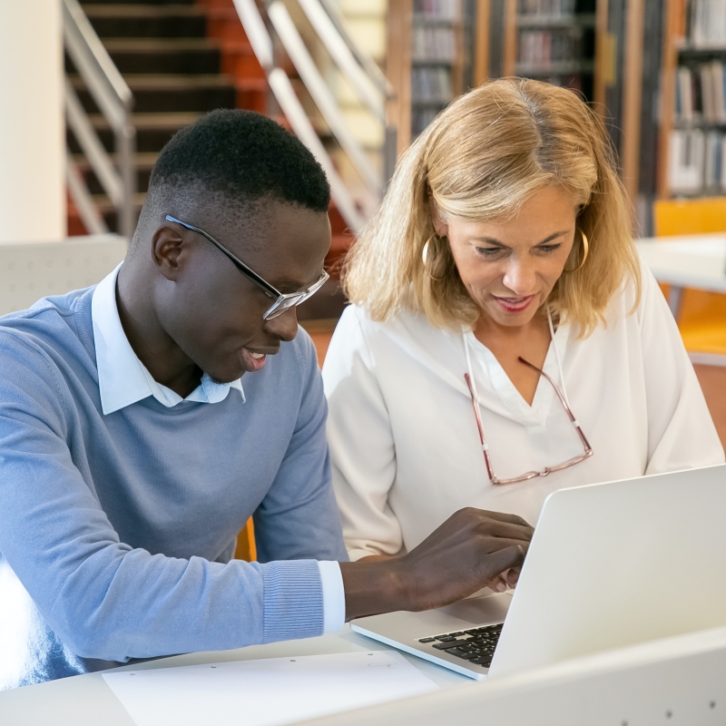 man and woman at laptop